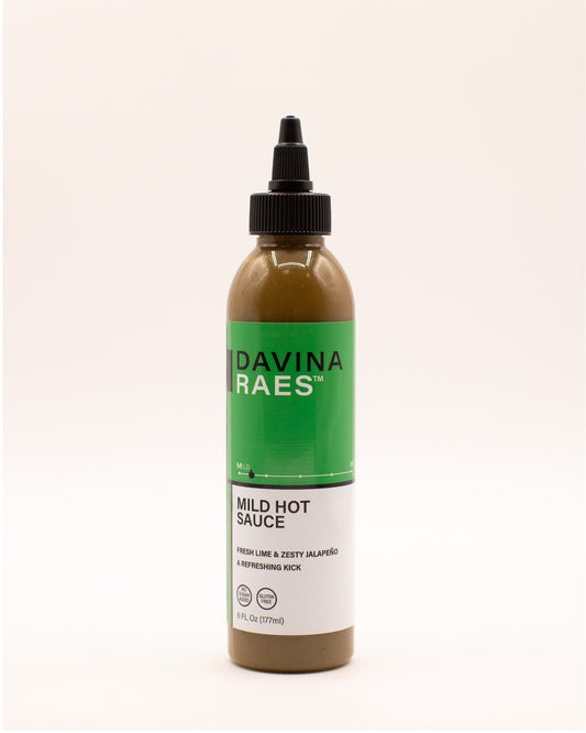 Bottle of Davina Raes Mild Hot Sauce on a white background